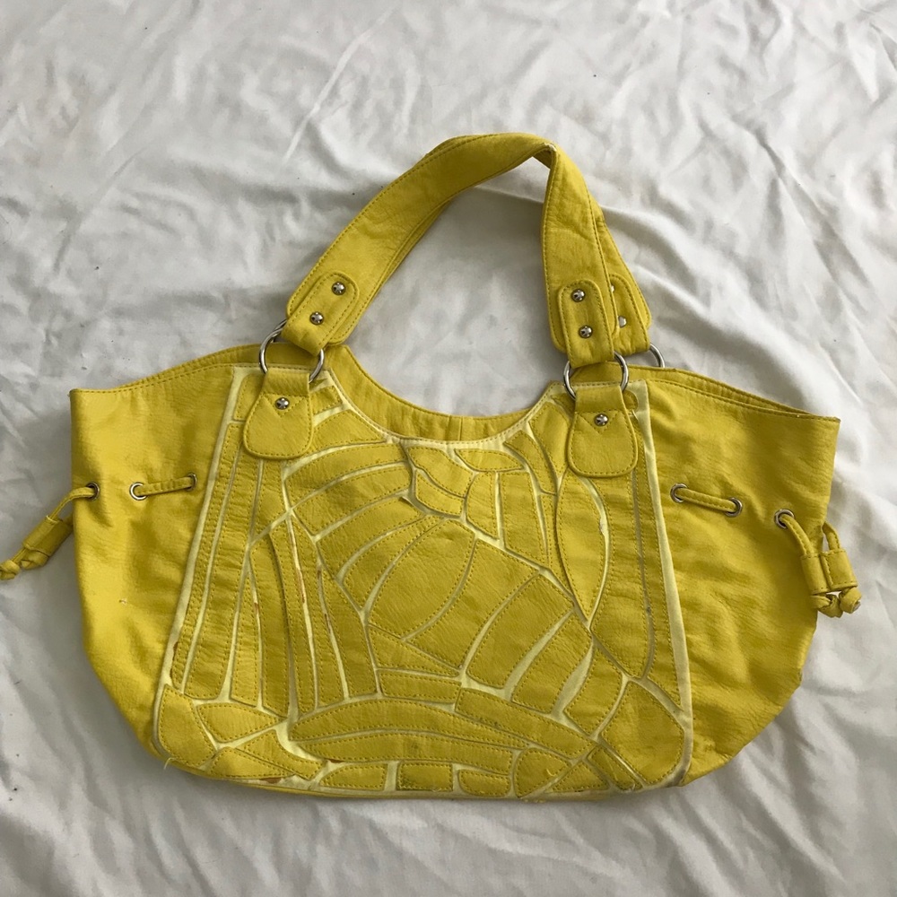 Francesca’s yellow purse